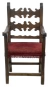 A 17th century style ladder back armchair