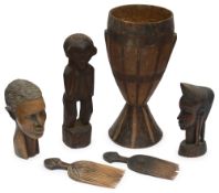 A West African carved wooden vessel, late 19th/early 20th century