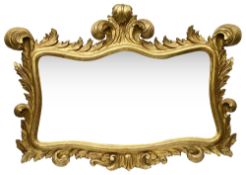 A late 19th century Italian carved giltwood wall mirror