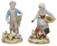A pair of late 19th century Meissen polychrome porcelain figures