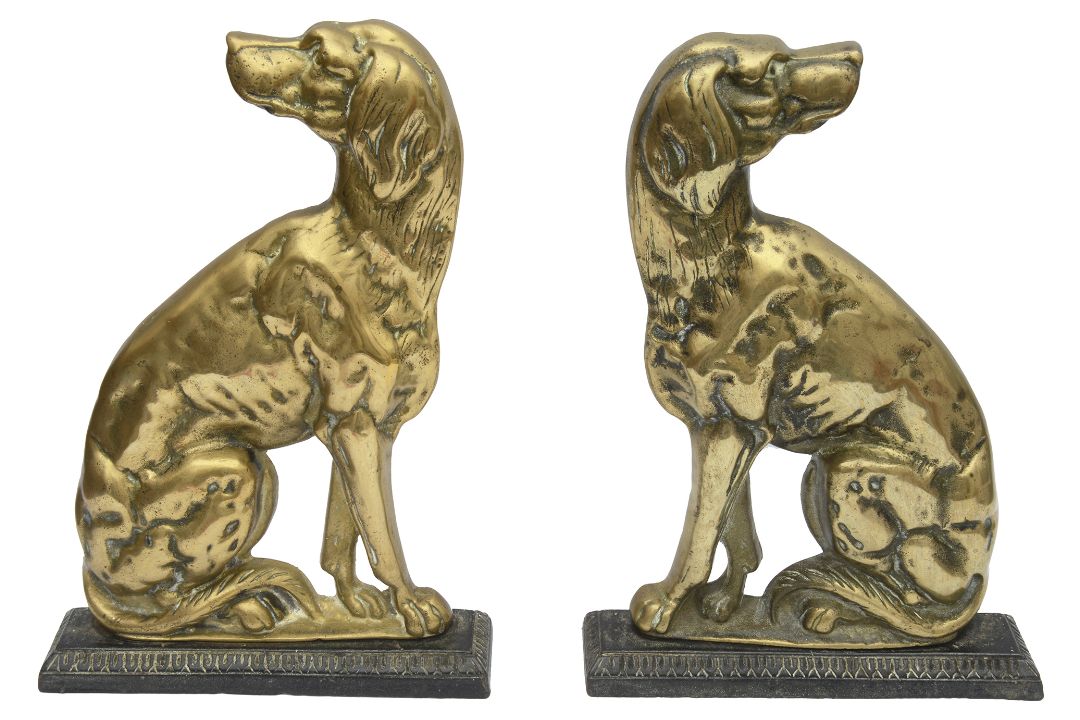 A pair of Victorian brass and cast iron doorstops