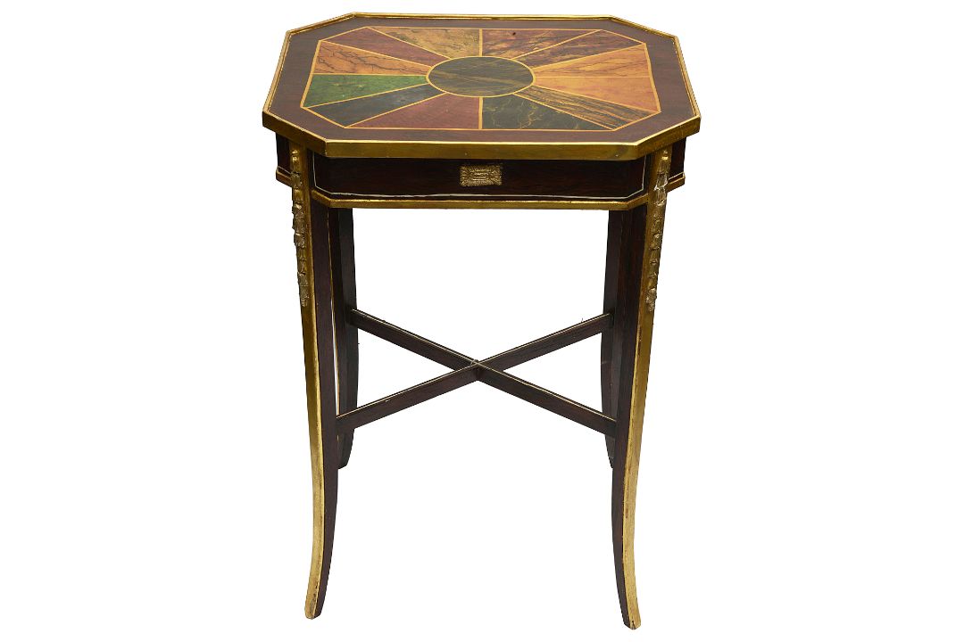 A George IV simulated rosewood and giltwood occasional table