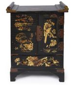 A Japanese Meiji period black and gilt lacquer kodansu table cabinet