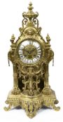 A late 19th century French brass mantle clock
