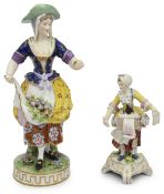 A mid 19th century Derby polychrome porcelain figure of a flower seller