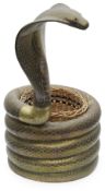 An early 20th century Indian novelty brass cobra jardiniere