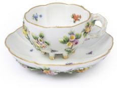 A late 19th century Meissen small porcelain cabinet cup and saucer