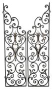 A pair of wrought iron garden gates