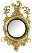 A Regency giltwood convex girandole mirror