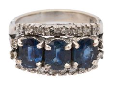 A sapphire and diamond trilogy ring
