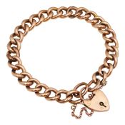 A 9ct rose gold curb link bracelet with heart lock