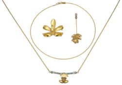 A South American frog necklace and pin and wire choker with brooch