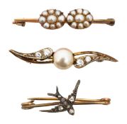 A diamond set swallow pin a seed pearl pin and one other