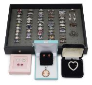 A quantity of silver rings, earrings and pendants