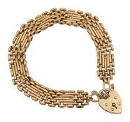 A 15ct gold fancy link five bar gate bracelet