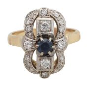 A diamond and gem stone rectangle dress ring