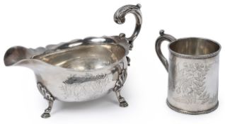 A George II silver sauceboat and a Victorian christening mug