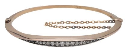 A Victorian diamond set hinged bangle