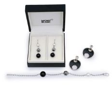 A Mont Blanc pearl and silver bracelet with two sets of earrings