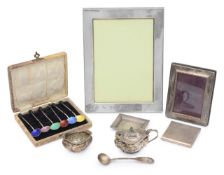 A collection of silver to include photograph frames and other items