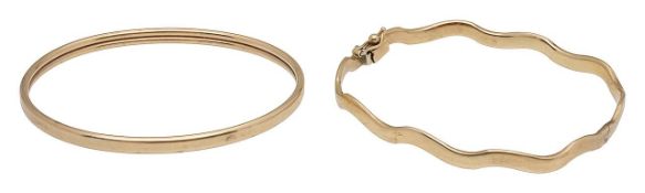 A 9ct gold pair of bangles