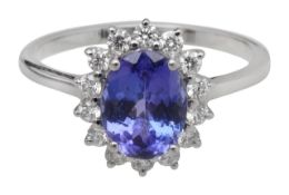 A tanzanite and diamond platinum cluster ring