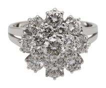 A diamond set cluster ring