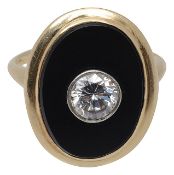 A diamond onyx signet ring