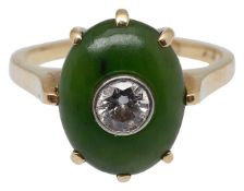 A diamond and nephrite ring
