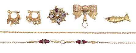 A garnet and rock crystal necklace, bow fob and four more