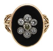 An onyx and diamond set daisy ring