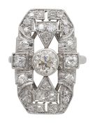 An Art Deco diamond and platinum cluster panel ring