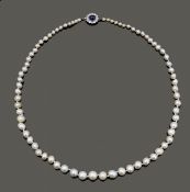 A graduated natural freshwater pearl necklace