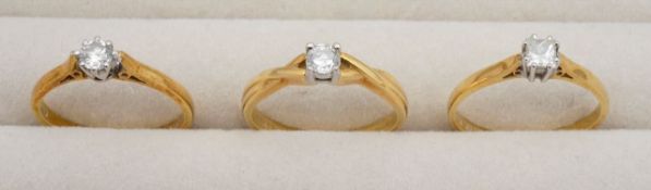 A trio of 18ct diamond rings