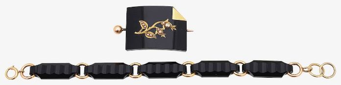 A Victorian onyx brooch and an onyx panel bracelet