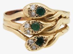 A diamond and emerald triple headed serpent ring