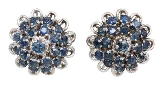A pair of sapphire set bombé earrings
