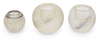Three late 19th century glass match striker balls,