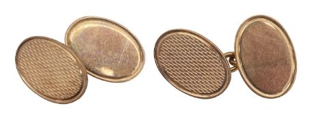 A pair of 9ct oval cufflinks