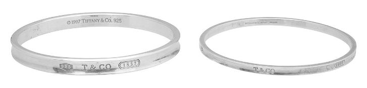 A pair of solid silver Tiffany bangles