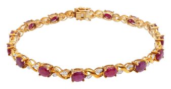 A 9ct gold ruby and diamond line bracelet