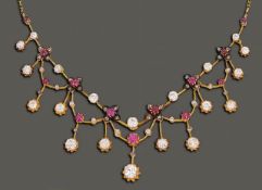 An Edwardian diamond and ruby fringe necklace