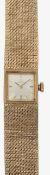 A 9ct gold lady's Omega manual wind bracelet wrist watch