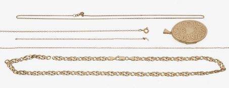 A large 9ct gold oval locket and various 9ct chains