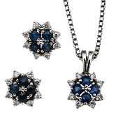 A matching diamond & sapphire pendant & studs