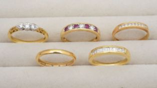 A collection of 18ct gold diamond rings