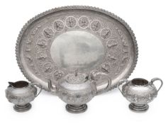 An Indian colonial silver three piece tea service and tray c.1900