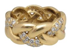 An 18ct diamond eternity ring with French marks