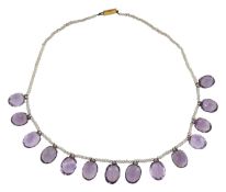 An Edwardian amethyst and seed pearl fringe necklace