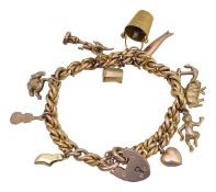 A 9ct charm bracelet and loose charms